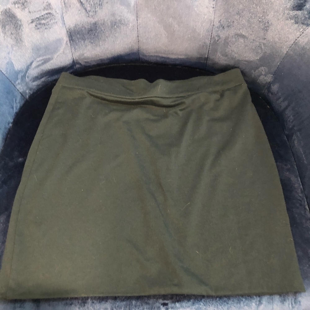 Teal/green mini skirt.